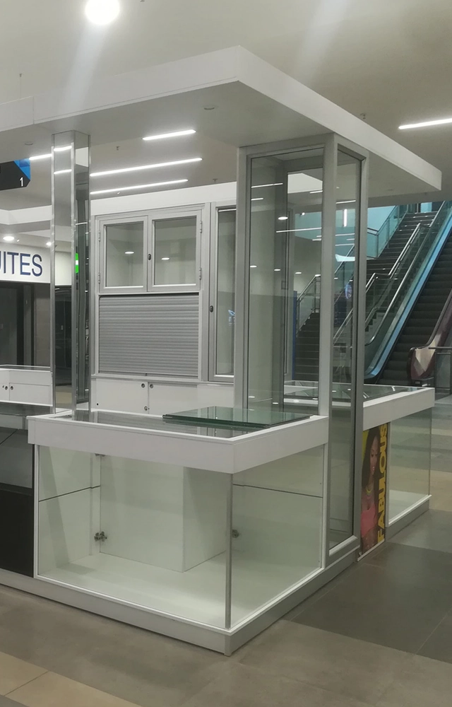 Commercial shop fitting installation with service counter and display units by Red Beard Joinery — portfolio project image 2